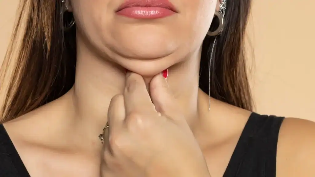 An image of a woman with double chin, sad, worried : Non Surgical Double Chin Removal Treatment in High Wycombe, UK